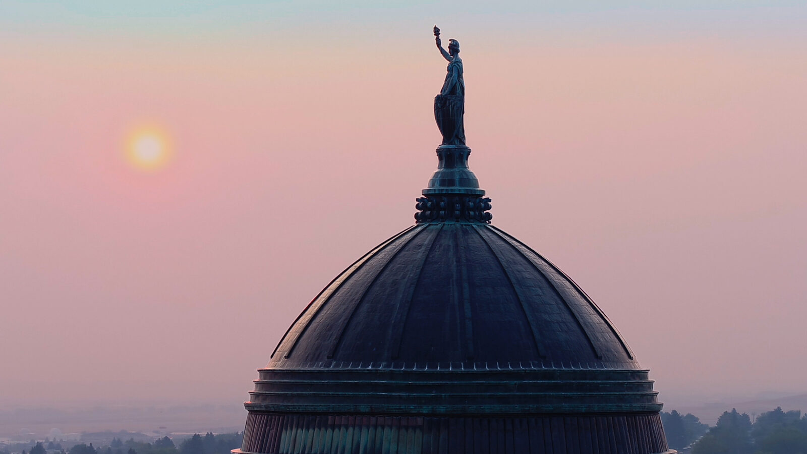 Montana's State Capitol building at dawn — still from DARK MONEY, a PBS Distribution release