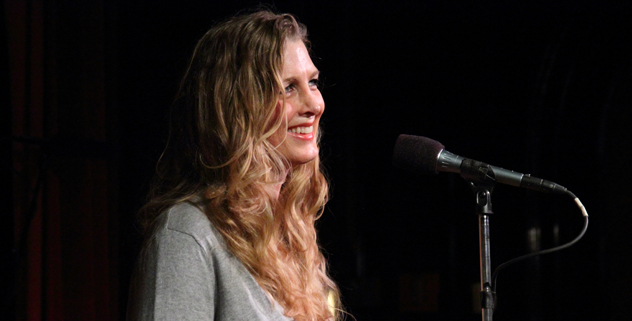 Kim on The Moth mainstage, telling a personal story